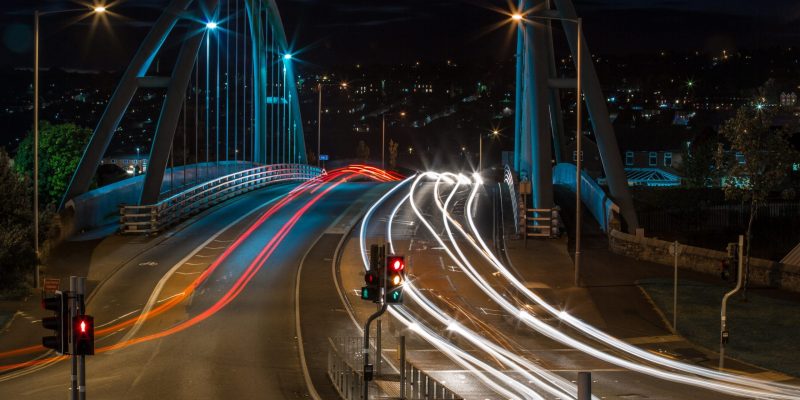 Illuminated Wainwright Bridge at Blackburn, Lancashire, with car light trails